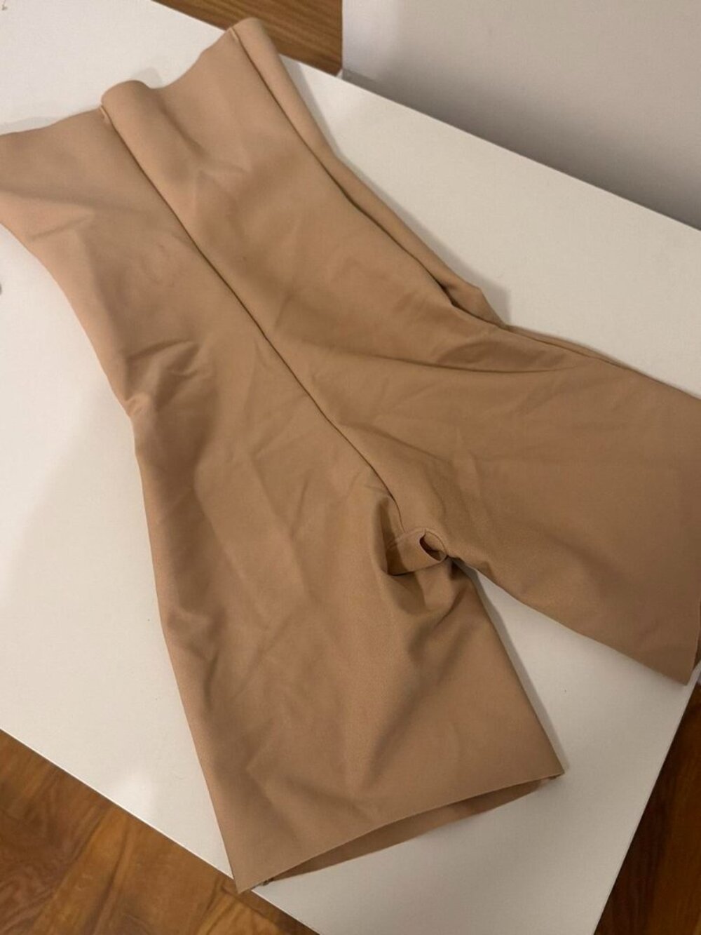 Skims tan shapewear with a flattering fit